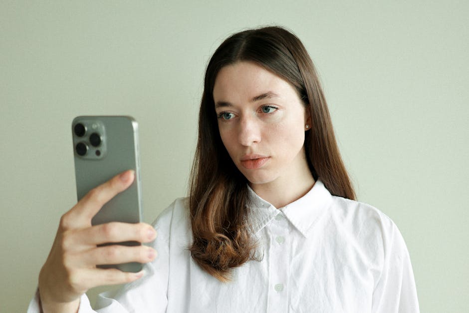 Smartphone taking a selfie with distorted perspective
