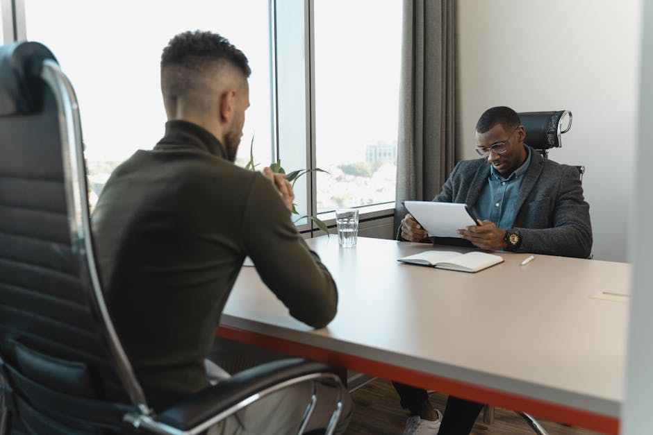 Professional taking notes and preparing for a job interview