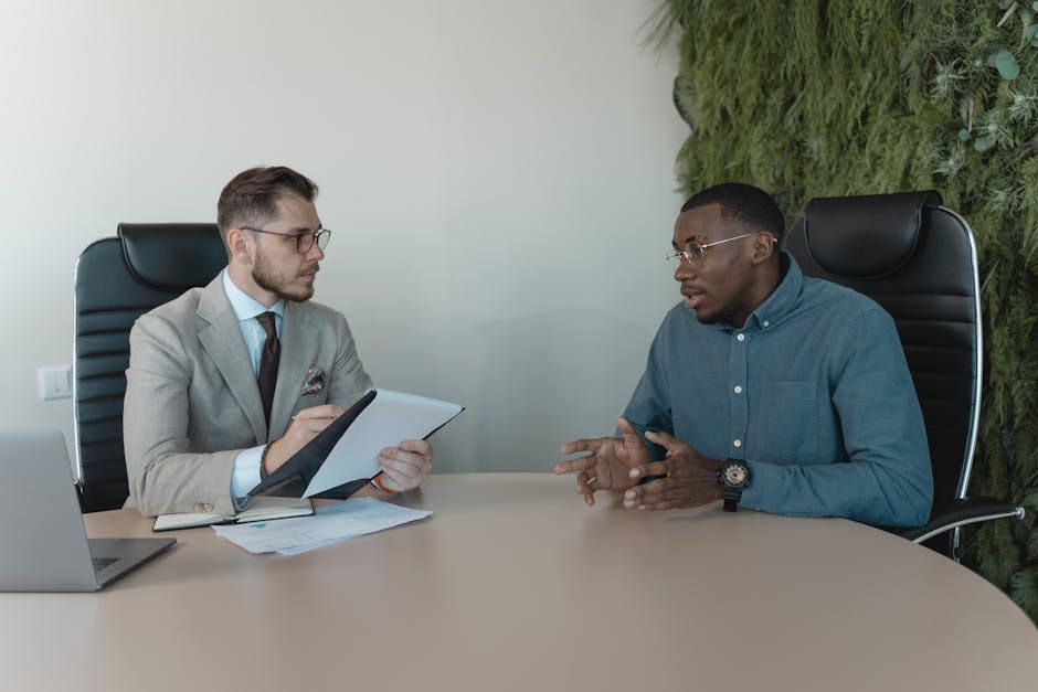 Team meeting with a manager and candidate discussing a job opportunity