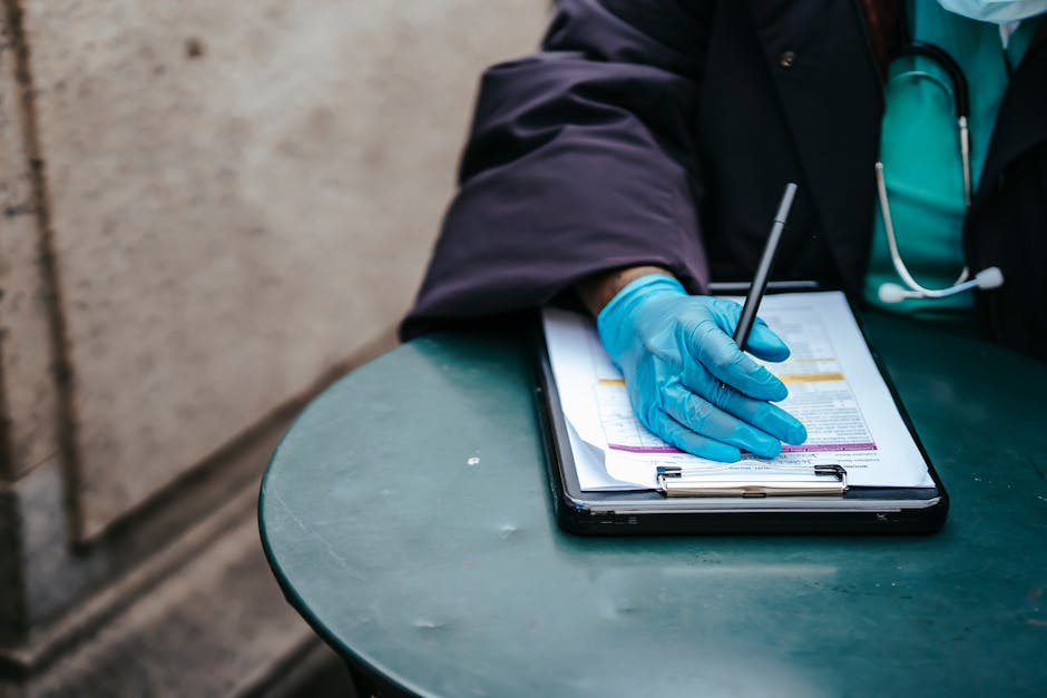 Employee on medical leave reviewing paperwork at home