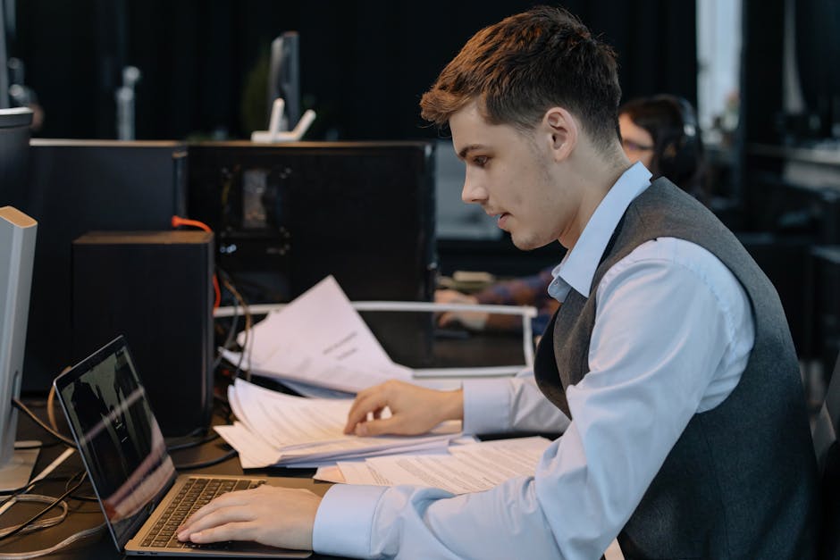 Job seeker researching a company on a laptop before sending a spontaneous application