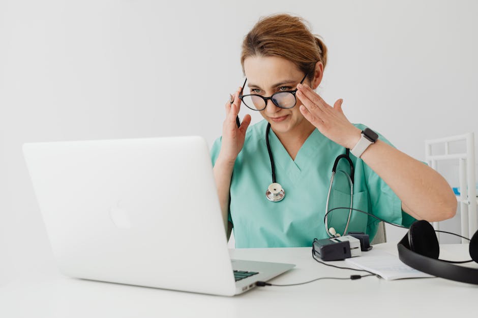 Doctor consultation via video call on laptop