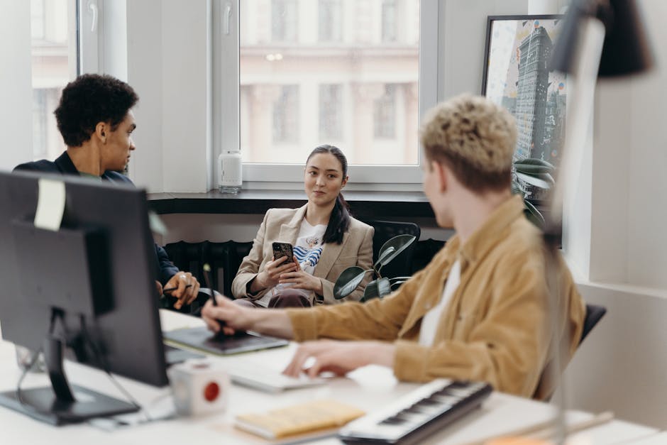 Confident employee discussing ideas with manager in a modern office