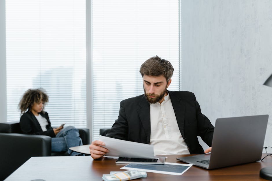 Recruiter reviewing a cover letter on a laptop