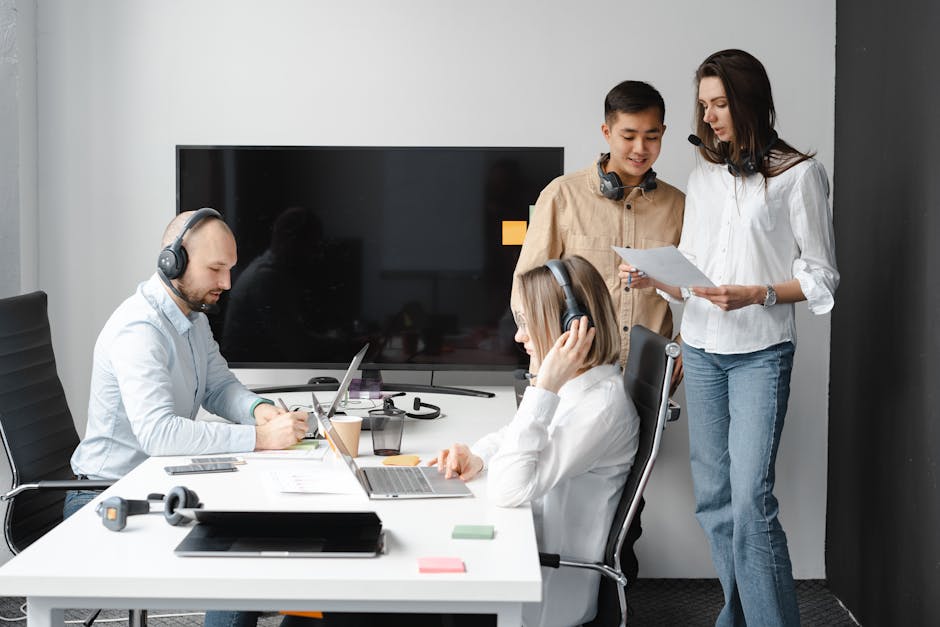Team meeting in office discussing employee leave and scheduling