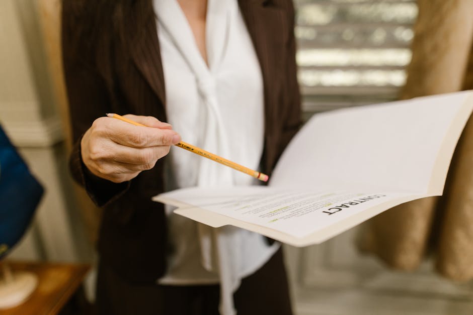 Business professional reviewing salary and benefits paperwork