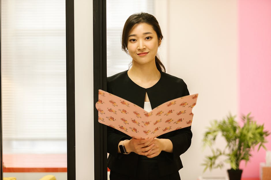 Employee handing a formal letter to HR in an office