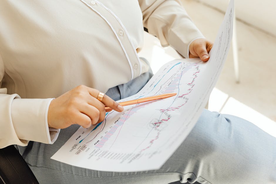 Business professional analyzing pension points and retirement contribution statements