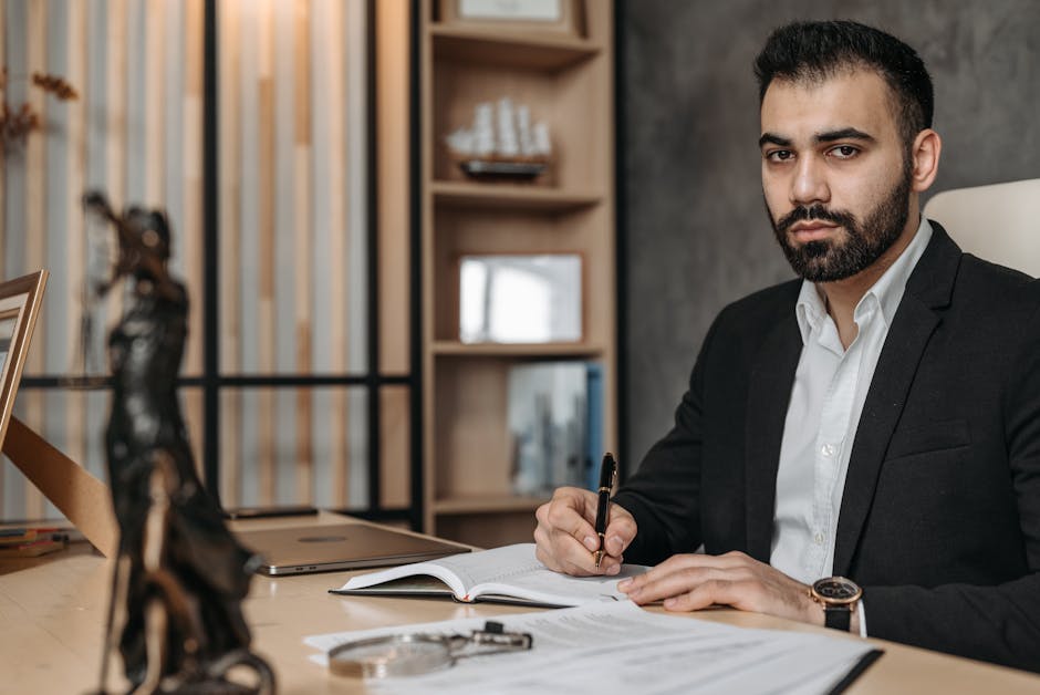 Business advisor taking notes during a workplace consultation