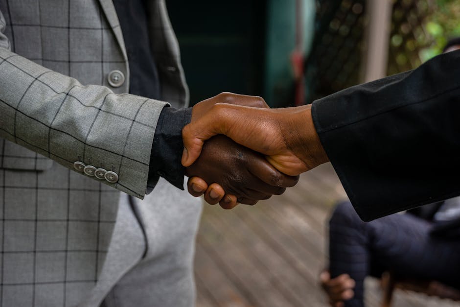 Handshake between two professionals after a successful recommendation