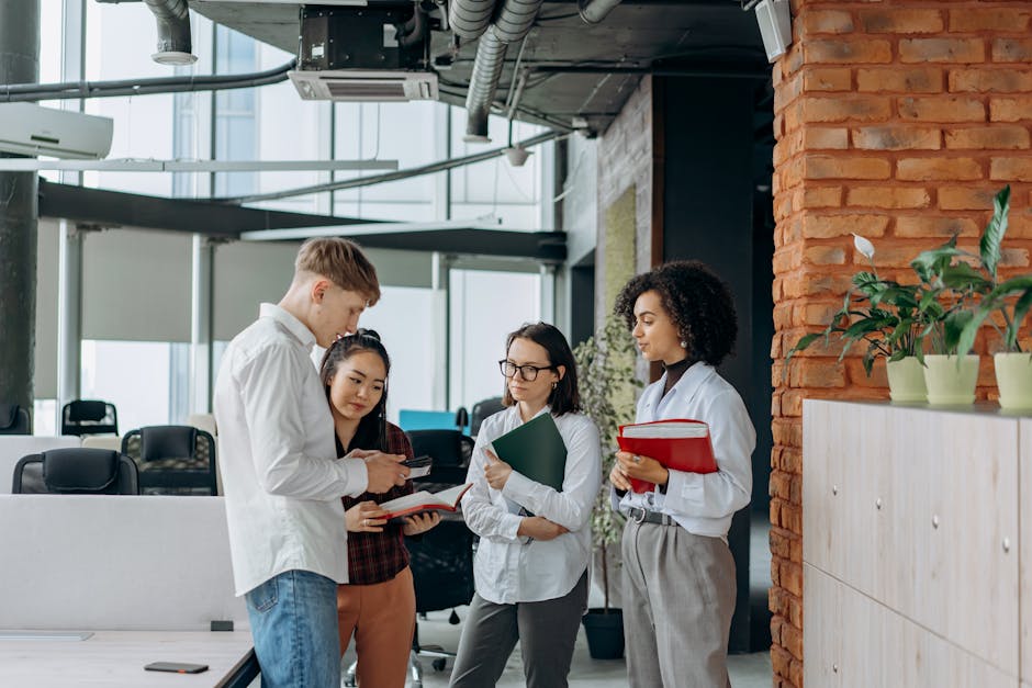 Team collaborating in an office meeting around a table