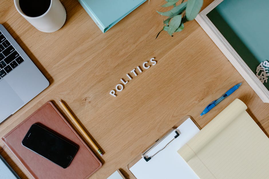 Printed letter template on a desk with pen and laptop