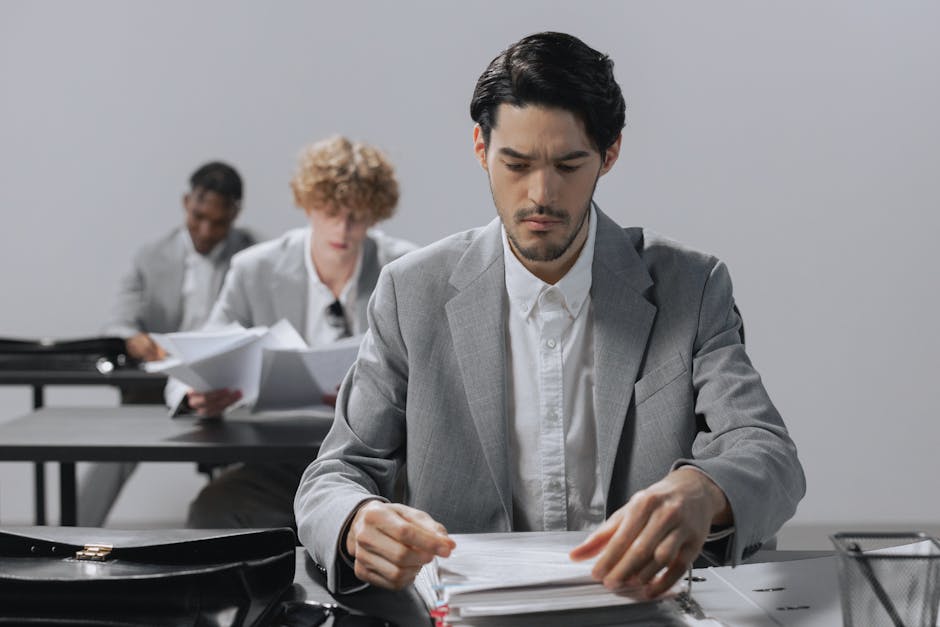 HR manager reviewing employee absence documents
