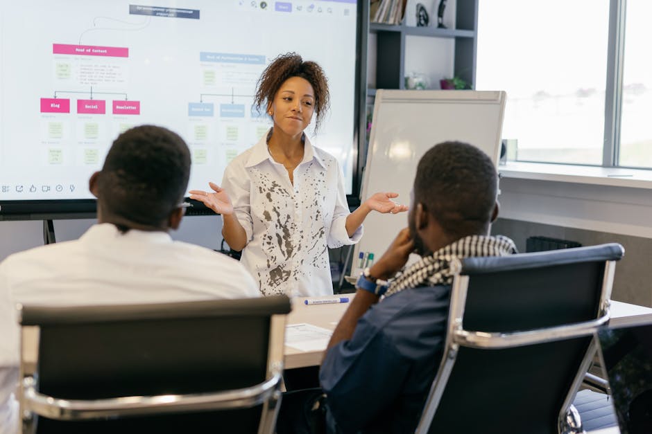 Employees in a training session for digital skills and career development