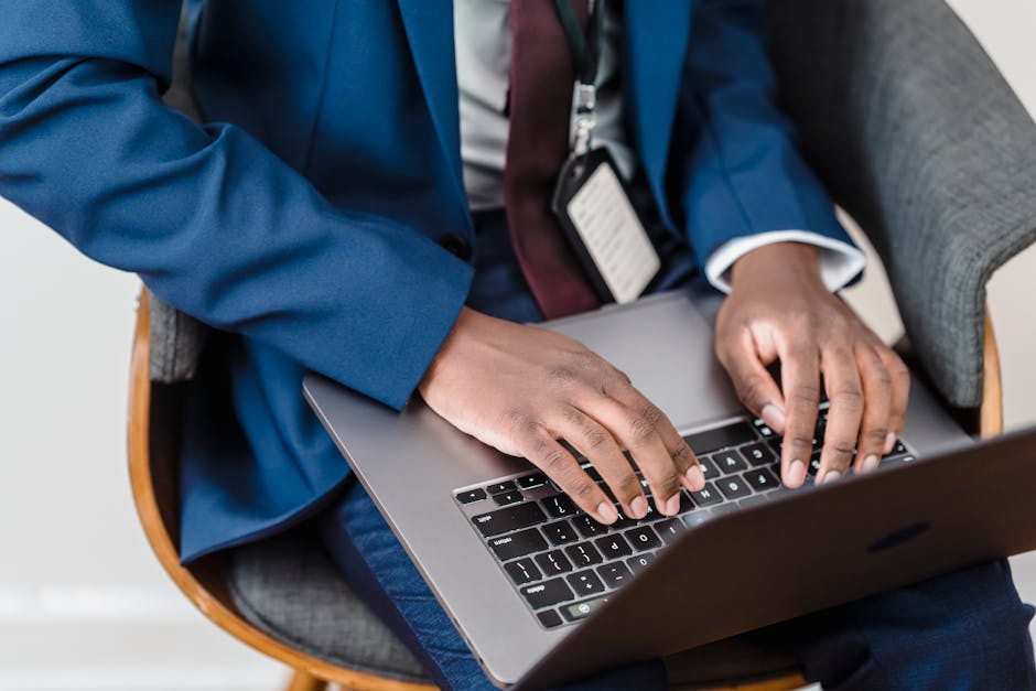 Recruiter reviewing a personalized message on a laptop