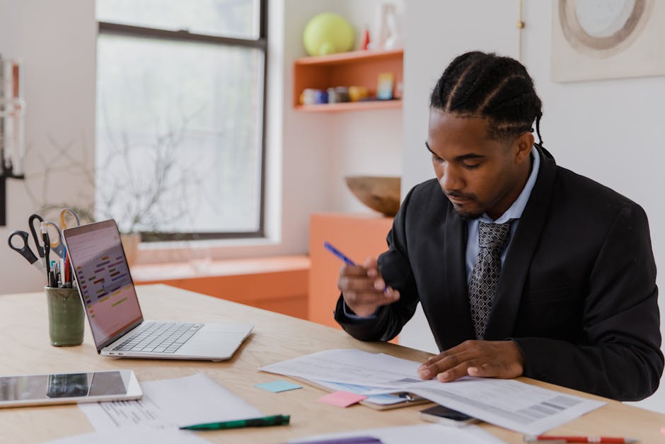 Professional reviewing career path and salary growth on documents