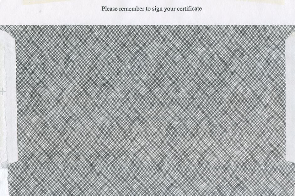 Close-up of a signed employment certificate or official document