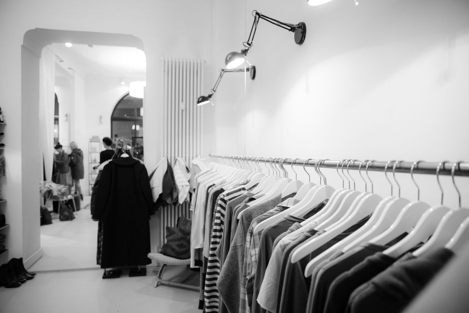 Business formal and smart casual interview outfits on hangers