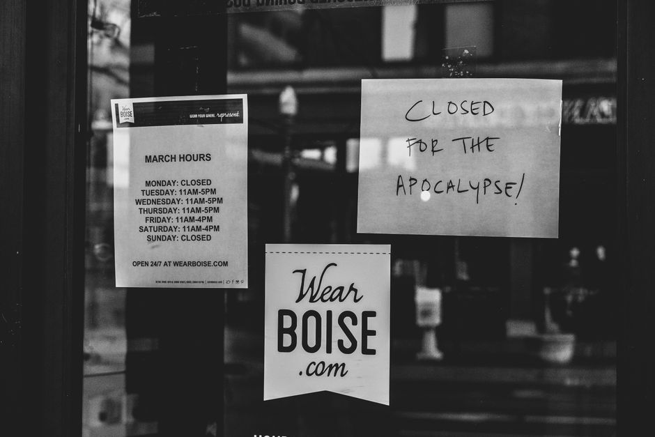 Office closed sign on a workplace door during vacation shutdown