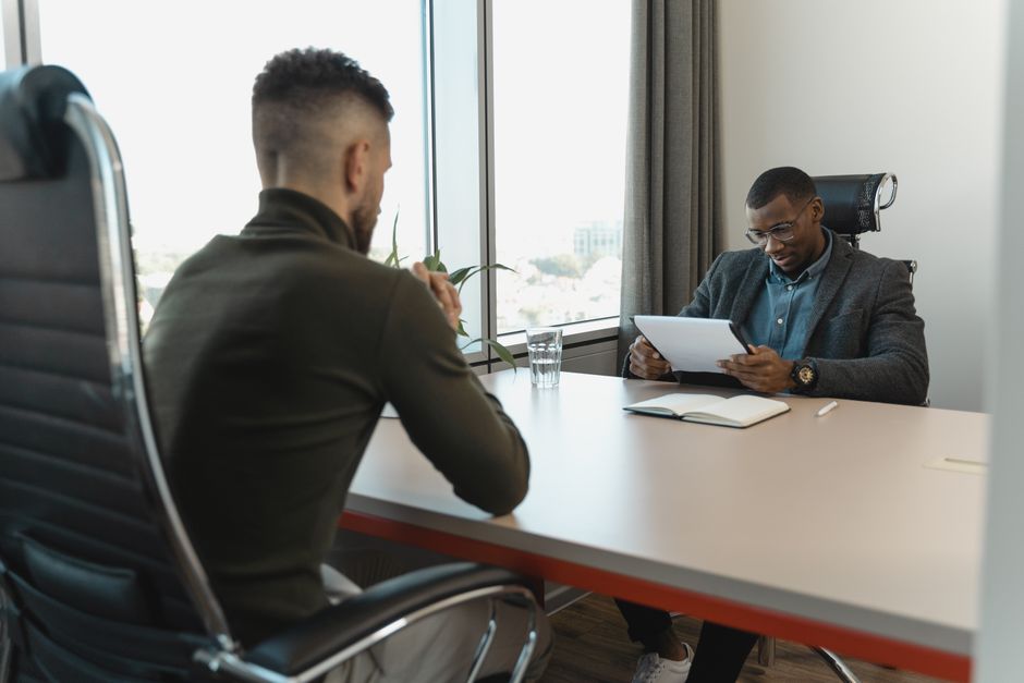 Business professional in a calm office preparing for an interview