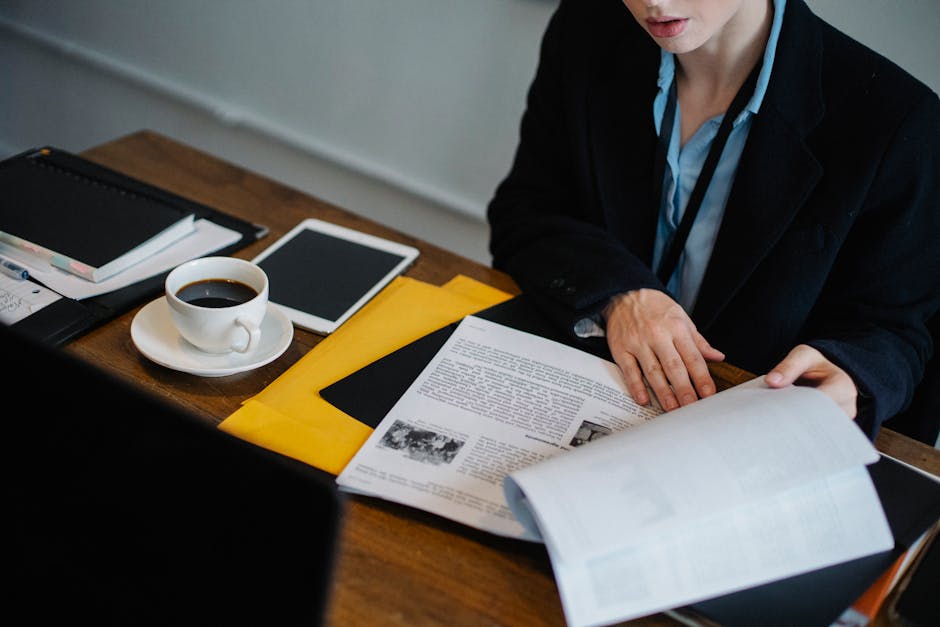 New employee reviewing onboarding documents at a desk