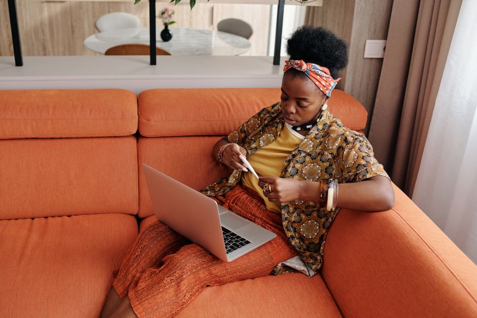Person checking social benefits on a laptop at home
