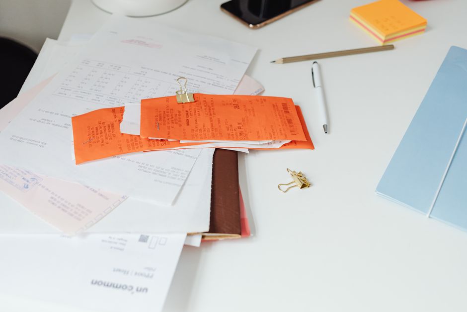 Employee reviewing severance paperwork and final payslip