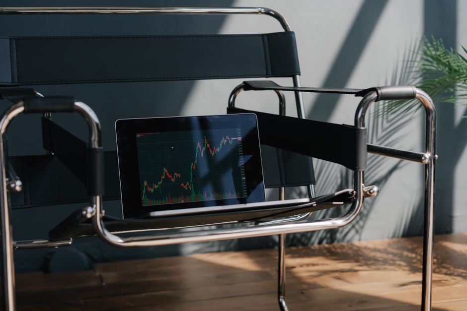 Modern office with financial charts and wealth management concept