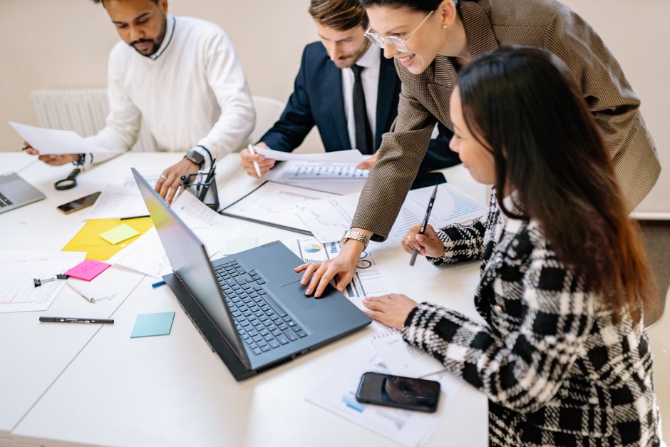 Business team collaborating around a table in a modern office