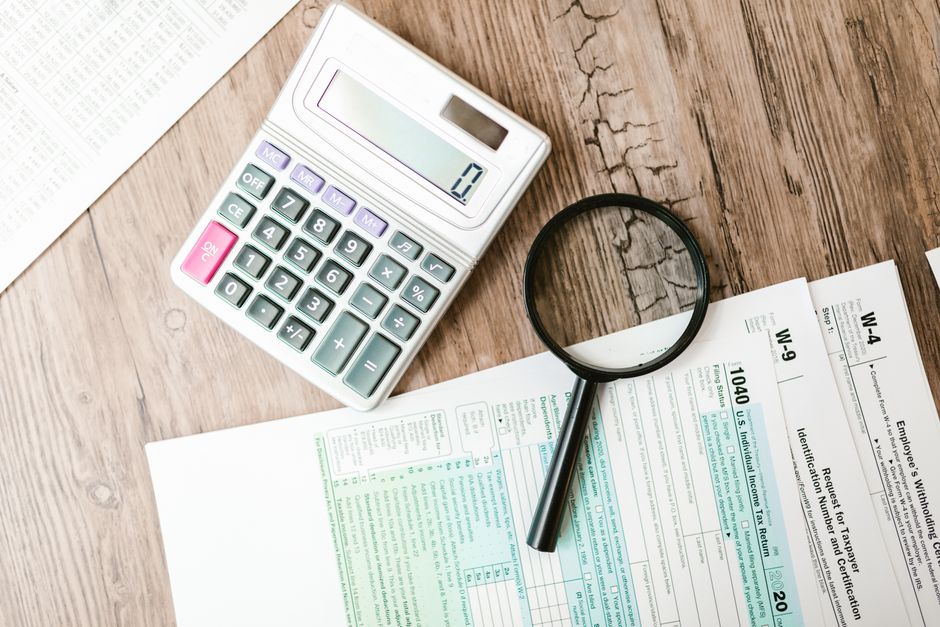 Retirement planning concept with calculator and documents