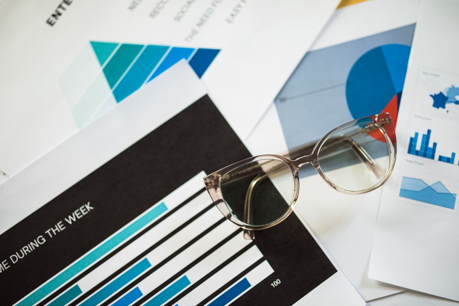 Corporate salary and compensation concept with charts and documents